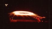 #925.[138] 21st September 1981. Quetzals beamship hovers and rotate about 10 meters above the parking lot, while burning static energy which has a rotating effect with the ship. Billy stands in this fire ring and holds a microphone above. See Contact Report 148.