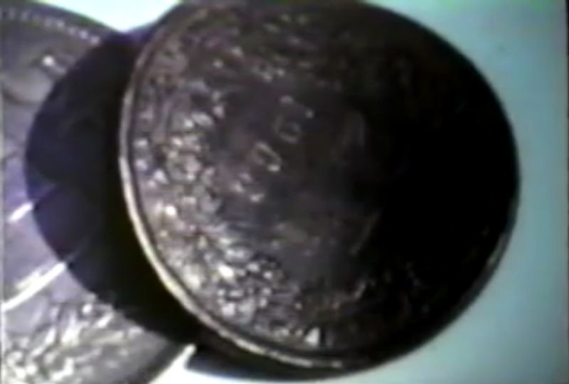 Tập tin:Coinbending2.jpg